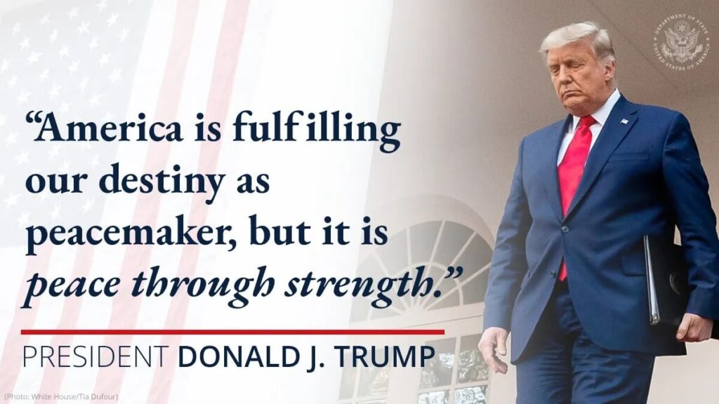 Bellamy Former U.S. President Donald Trump walks while holding a folder, next to a quote about peace through strength and the presidential seal in the background. Myrtle Beach